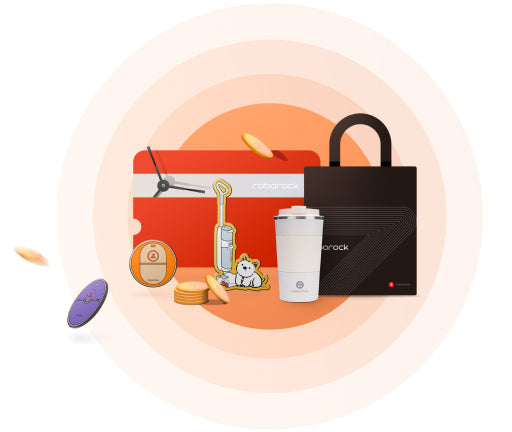 Collection of Roborock branded merchandise, including a blacktote bag, white tumbler