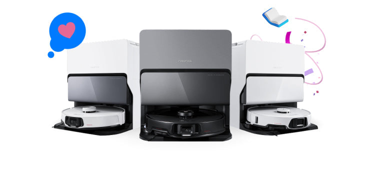 Three Roborock robot vacuums docked in their base stations